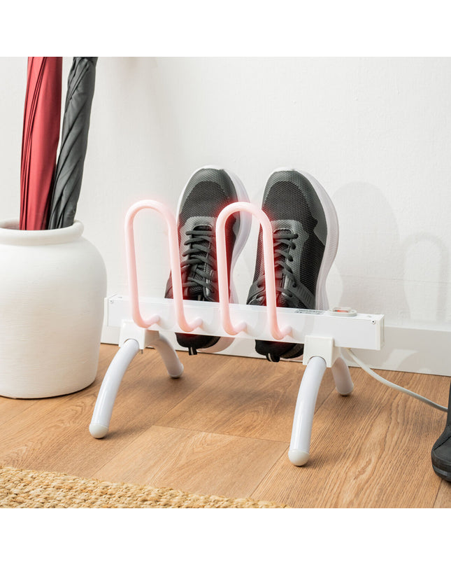 InnovaGoods electric shoe rack with 2 pairs, 40W, for home organization, shown with shoes on a modern storage unit.