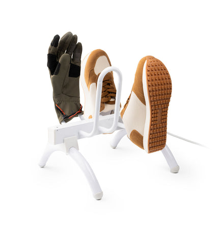 InnovaGoods electric shoe rack with 40W capacity, holding two pairs of shoes for organized home storage.